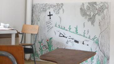 Wandbild in einer Normalisierungszone der Farc: "Beerdigen wir unsere Waffen auf dass neue Hoffnung daraus erwachse"