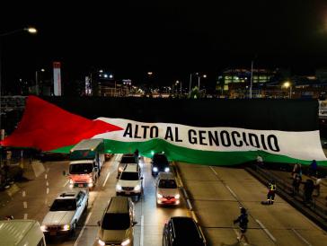 "Stoppt den Genozid": Palästinensische Flagge über einer Straße in Bogotá "Stoppt den Genozid": Palästinensische Flagge über einer Straße in Bogotá