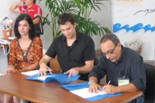 Cuba-Si-Mitglied Marlene Cadenaba, Koordinator Konstantin Seeger und der PL-Vizepräsident Edilberto Méndez Kubanische Nachrichtenagentur in BRD stärker präsent